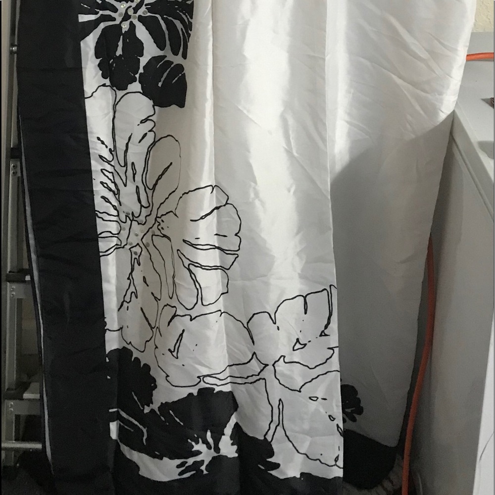 Black and white flowered standard shower curtain.